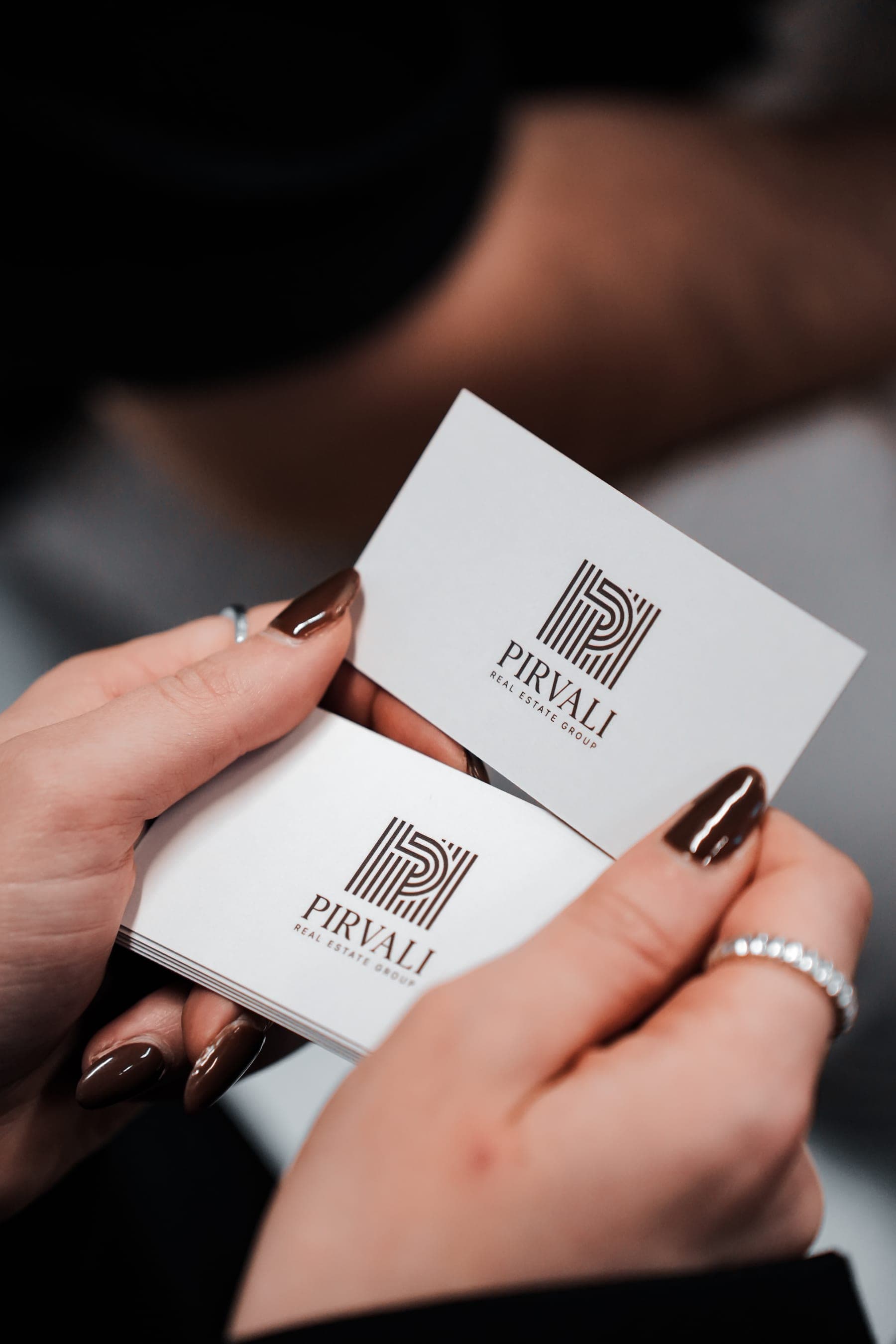 Pirvali business cards held in hand